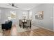 Dining area with neutral color scheme and plenty of space for entertaining at 9756 Mount Kataka Pt, Littleton, CO 80125