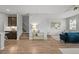 Bright living room featuring hardwood floors and ample natural light at 9756 Mount Kataka Pt, Littleton, CO 80125