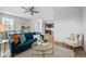 Bright and airy living room flowing into dining area, perfect for entertaining at 9756 Mount Kataka Pt, Littleton, CO 80125