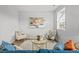 Cozy living room with stylish decor, including a modern coffee table and plush seating at 9756 Mount Kataka Pt, Littleton, CO 80125