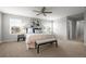 Airy main bedroom with a ceiling fan, natural light, and an inviting atmosphere at 9756 Mount Kataka Pt, Littleton, CO 80125