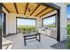Outdoor kitchen with stainless steel grill, countertop space, and seating area, perfect for entertaining at 9756 Mount Kataka Pt, Littleton, CO 80125