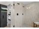 Modern bathroom featuring a glass-enclosed shower with neutral-toned tiles and dual showerheads at 535 Josephine St, Denver, CO 80206