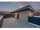 Relax on this rooftop deck with a tiled floor and an inviting spot for entertaining at 535 Josephine St, Denver, CO 80206