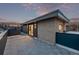 Expansive rooftop deck with stylish grey tile flooring, perfect for entertaining with sunset views at 535 Josephine St, Denver, CO 80206