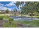 Community playground with modern play structures and landscaped surroundings at 6747 W Jewell Pl, Lakewood, CO 80227
