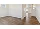 Bright living room featuring stylish wood floors and neutral paint, perfect for modern living at 2256 Base St, Fort Lupton, CO 80621