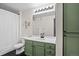 Bathroom with a modern vanity, updated lighting, and combined tub and shower at 9961 E Idaho Cir # 104, Aurora, CO 80247