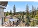 Cozy balcony with outdoor seating, perfect for enjoying peaceful mountain views at 427 Whispering Pines Cir, Breckenridge, CO 80424