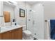 Modern bathroom featuring a glass enclosed shower, sleek vanity, and stylish fixtures at 427 Whispering Pines Cir, Breckenridge, CO 80424