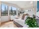 Bright bedroom with large windows showcasing mountain views and a comfortable bed at 427 Whispering Pines Cir, Breckenridge, CO 80424