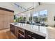 Bright open concept kitchen and living area with mountain views through large windows at 427 Whispering Pines Cir, Breckenridge, CO 80424