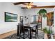 Cozy dining room features a stylish chandelier, access to the outdoor patio, and a decorative area rug at 214 Poppy St, Golden, CO 80401