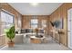 Living Room featuring modern furniture and wood paneled walls at 520 Tennyson St, Denver, CO 80204