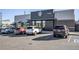 Commercial building with a drive thru and several cars parked outside at 10151 W 38Th Ave, Wheat Ridge, CO 80033