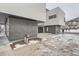 Modern townhome with brick accents, visible utilities, and a shared driveway at 10151 W 38Th Ave, Wheat Ridge, CO 80033