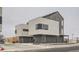 Modern architecture showcases clean lines and mixed materials of these stunning townhomes at 10151 W 38Th Ave, Wheat Ridge, CO 80033