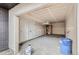 Spacious two-car garage featuring white doors, concrete floors, and ample storage space at 10151 W 38Th Ave, Wheat Ridge, CO 80033