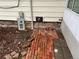 Exterior electrical components and brick foundation at 405 Dogwood Ave, Brighton, CO 80601