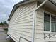 Exterior view of home and yard at 405 Dogwood Ave, Brighton, CO 80601