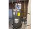 Water heater in unfinished basement with energy guide at 405 Dogwood Ave, Brighton, CO 80601