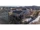 Aerial view of the back of the home featuring a large landscaped lot, deck and patio at 2897 Hillcroft Ln, Castle Rock, CO 80104