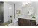 Modern bathroom with sleek vanity, black/white tiled shower, and stylish fixtures at 4625 W 50Th Ave # 110, Denver, CO 80212