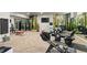 Spacious home exercise room featuring state-of-the-art equipment and mirrored walls at 4625 W 50Th Ave # 110, Denver, CO 80212