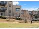 Scenic view of the building with a golf course in the community at 4625 W 50Th Ave # 110, Denver, CO 80212
