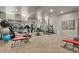 Spacious gym featuring modern equipment, large mirrors, and ample room for various workout activities at 4625 W 50Th Ave # 110, Denver, CO 80212