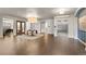 Grand lobby with herringbone floors, elegant lighting, and elevator access at 4625 W 50Th Ave # 110, Denver, CO 80212