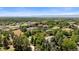 Aerial view of the neighborhood, showing surrounding homes and mountain views at 6200 Charrington Dr, Cherry Hills Village, CO 80111