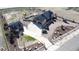 Expansive property showcasing a spacious driveway, meticulously landscaped grounds, and guest house alongside the main residence at 15280 Bannock St, Broomfield, CO 80023
