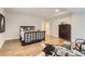 Finished basement bedroom offers lots of space, a bed, and a chest of drawers at 15280 Bannock St, Broomfield, CO 80023
