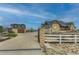 Stunning stone home with a long driveway, and a detached garage at 15280 Bannock St, Broomfield, CO 80023