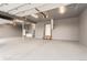 Expansive garage featuring ample lighting, a neutral palette, and significant parking and storage area at 15280 Bannock St, Broomfield, CO 80023
