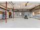 Spacious garage featuring metal walls, storage shelves, and ample room for vehicles or projects at 15280 Bannock St, Broomfield, CO 80023