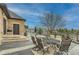 Outdoor patio featuring stone pavers, stone home construction, and outdoor seating for entertaining at 15280 Bannock St, Broomfield, CO 80023