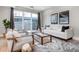 Bright living room with comfortable seating, stylish decor, and natural light flowing through sliding doors at 1933 Grove St, Denver, CO 80204
