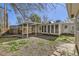 View of the backyard with a covered area and a storage shed at 3353 S Glencoe St, Denver, CO 80222