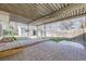 Large backyard patio with string lights and a view of the detached shed at 3353 S Glencoe St, Denver, CO 80222