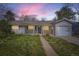 Charming single-story home with a well-manicured lawn and attached one-car garage at 3353 S Glencoe St, Denver, CO 80222