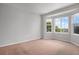 Bright, airy bedroom with large windows offering ample natural light and pleasant views at 5755 S Zante Cir, Aurora, CO 80015