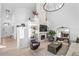 Two-story living room with fireplace, built-in shelving, and large windows at 806 Ridgemont Cir, Highlands Ranch, CO 80126