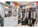 Large walk-in closet with ample shelving and hanging space at 806 Ridgemont Cir, Highlands Ranch, CO 80126