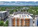 A lovely aerial shot overlooking nearby residences and lush green parks at 2729 W 28Th Ave # 401, Denver, CO 80211
