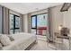 Serene bedroom offers ample natural light and contemporary decor with an adjacent study area at 2729 W 28Th Ave # 401, Denver, CO 80211