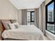 Tranquil bedroom featuring ample natural light with neutral tones for a peaceful retreat at 2729 W 28Th Ave # 401, Denver, CO 80211