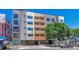 A modern apartment building with varied textures and colors offers covered parking and secure entry at 2729 W 28Th Ave # 401, Denver, CO 80211