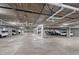 Well-lit parking garage featuring multiple parking spaces at 2729 W 28Th Ave # 401, Denver, CO 80211